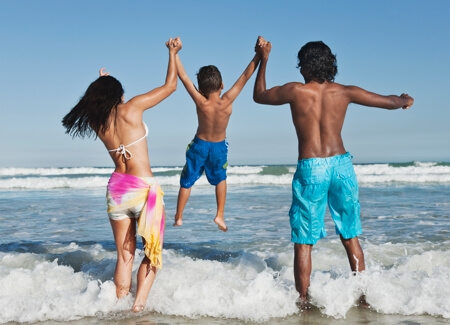 Family playing in the Outer Banks ocean