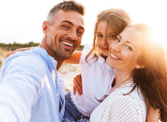 Family taking a Pic on Beach